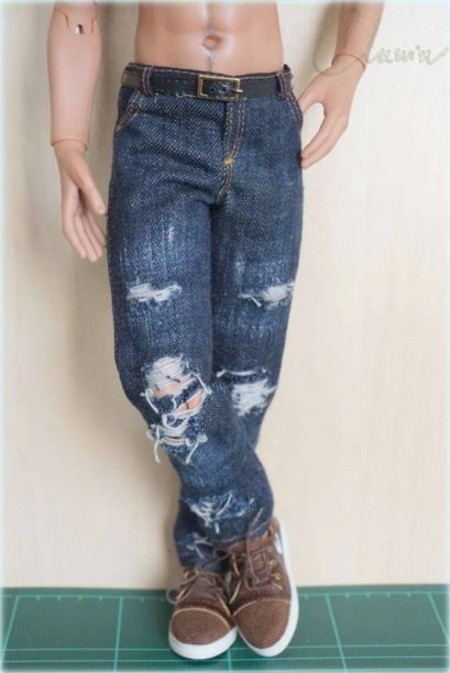 Dark blue jeans in  torn-style
